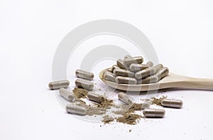 Close up herbal capsules isolate on white background. photo