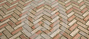 Closeup of a herringbone brick pattern