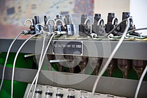 Close-up high pressure diesel fuel pump test bench