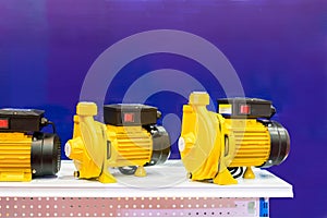 Close up high technology water centrifugal pump for high pressure suction in industrial work on shelf with copy space