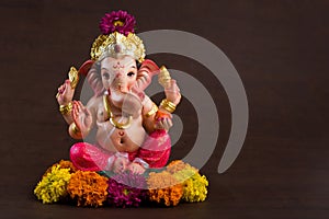 Hindu God Ganesha on Blured bokeh background, Ganesha Idol