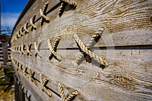 Close up historical wooden shipwreck reconstruction detail on land, Urla, Izmir, Turkey. Ancient Greek culture, Kyklades ship