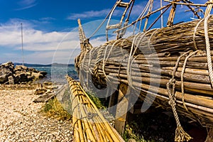 Close up historical wooden shipwreck reconstruction detail on land, Urla, Izmir, Turkey. Ancient Greek culture, Kyklades ship photo