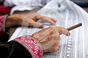 Close up Hmong hilltribe Writing candles to handmade batik in thailand