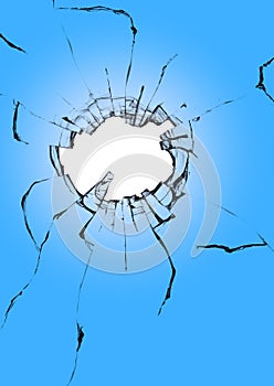 Close-up of a hole with cracks in a broken window. The effect of the destruction of glass by a shot from a weapon.