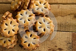 Close up of home made cookies on a wooden table, Sweet cookies on wooden background