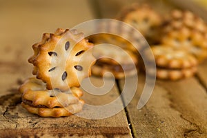 Close up of home made cookies on a wooden table, Sweet cookies on wooden background