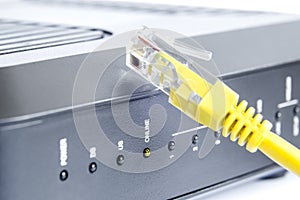 Close up of home modem with network cable. Internet, wlan and mobile connections