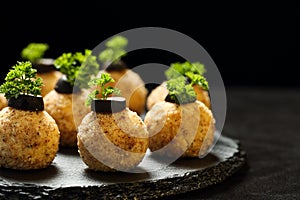 Close up of homemade delicious, healthy and non fried chicken balls appetizer with boiled chicken fillet, light mayonnaise, yellow