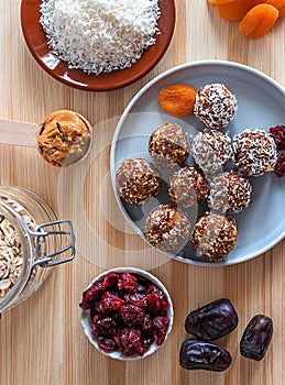 Close up homemade energy balls with ingredients