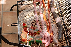 Close up of homemade sausages on the grill