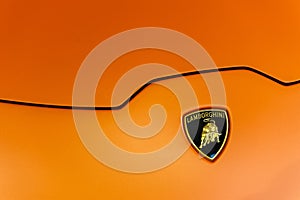 Close up of an hood and logo of a Lamborghini Huracan