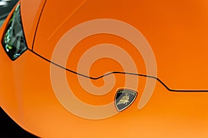 Close up of an hood and logo of a Lamborghini Huracan