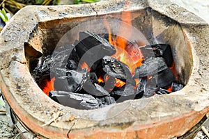 Hot coal in stove