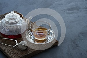 close up hot tea in a glass teapot