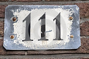 Close Up House Number 111