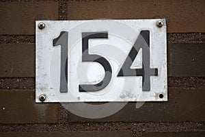 Close Up House Number 154 At Amsterdam The Netherlands 6-3-2024