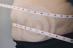 Human body and fat body part of paunch or belly and overweight o photo