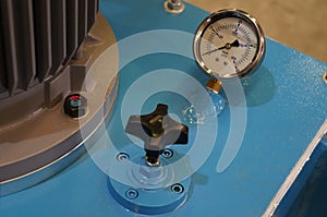 Close up Hydraulic Pressure Gauge in a hydraulic system.