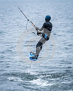 Close up of hydrofoil kite surfer in winter