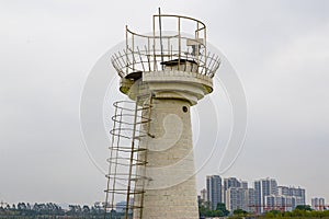 Close-up of a hydrological watch tower by the river