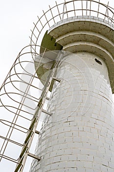 Close-up of a hydrological watch tower by the river