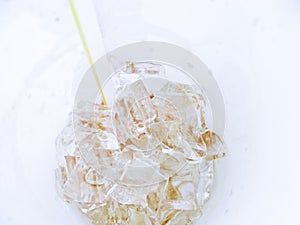 Close-up of ice inside cup of coke