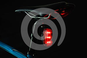 Close-up of illuminated bicycle tail light