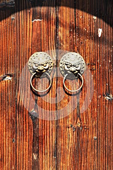Close-up image of ancient doors