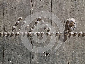Close-up image of ancient doors