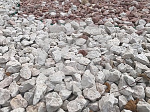 Close up image of Broken pebble stones or aggregates for decorative purpose and water fountains photo
