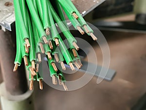 Close up image a bunch of pvc green copper cables