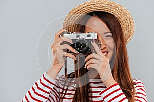 Close up image of carefree asian woman in sweater