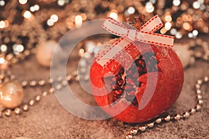 Close-up image of Christmas promegranate with retro filter effect