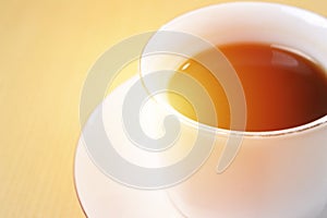 Close up image of coffee cup with sun light in the morning with copy space for text, time of coffee break