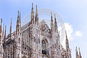 Close up image of the Duomo di Milano cathedral`s front facade in Milano, Italy