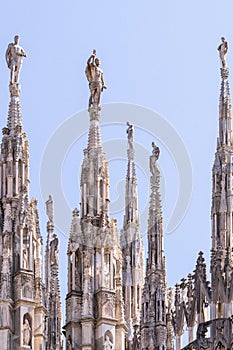 Close up image of the Duomo di Milano cathedral`s tower ornaments in Milano, Italy