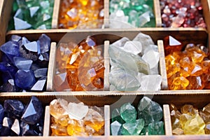 close-up image of ethically sourced raw gemstones in bins