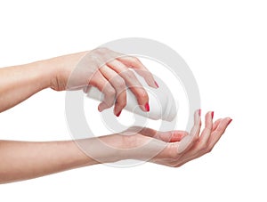 Close-up image of female hands adding talcum powder