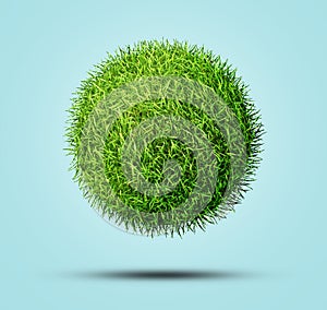 Green grass sphere shape in blue background. Clipping path