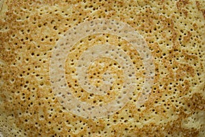 Close up image of fresh textured golden pancake as background