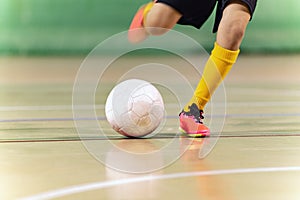 Close-up Image of Futsal Player Kicking Ball. Indoor Soccer Ball Kick. Indoor Football Equipment