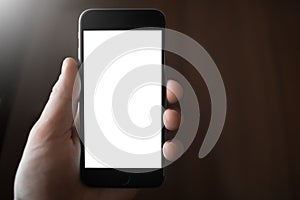 Close-up image of hand holding smartphone with blank mockup