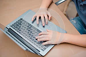 Close up image of hands typing on laptop computer keyboard , online, technology, internet network communication concept