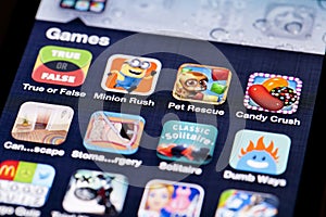 Close-up image of an iPhone screen with icons of