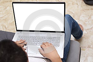 Close up image of  laptop mock up, computer monitor with white screen template, man typing on laptop