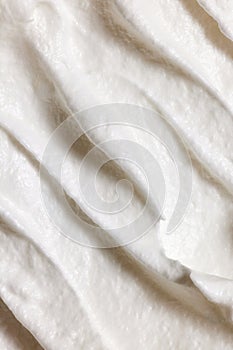 Close-up image of melted ice-cream. Vanilla natural ice cream texture