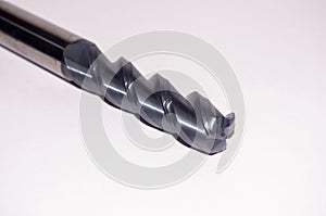 Close-up image of a metalworking instrument, featuring a mill endmill drill tap reamer