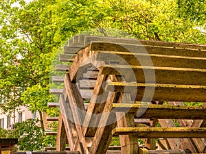 Close up image of old traditional wooden millwheel