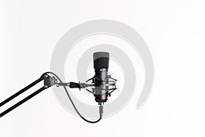 A close up image of proffesional studio microphone isolated on the white background